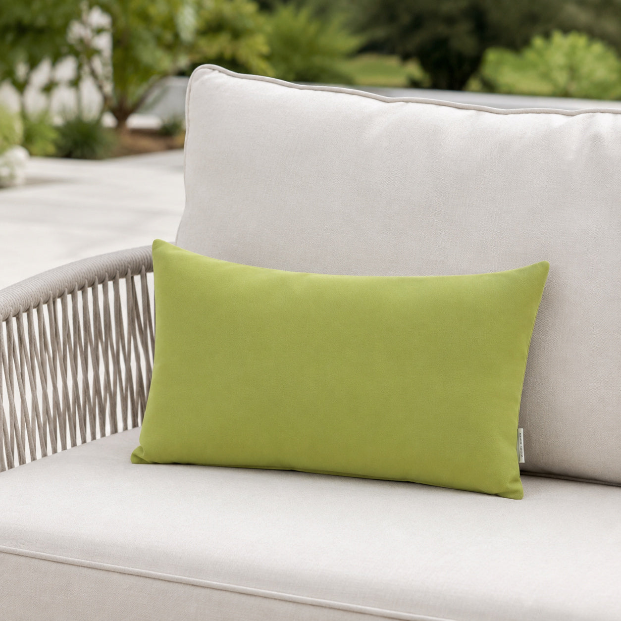 Sunbrella Outdoor Solid Pillow - Avocado Green - 12x20 rectangular pillow - lifestyle
