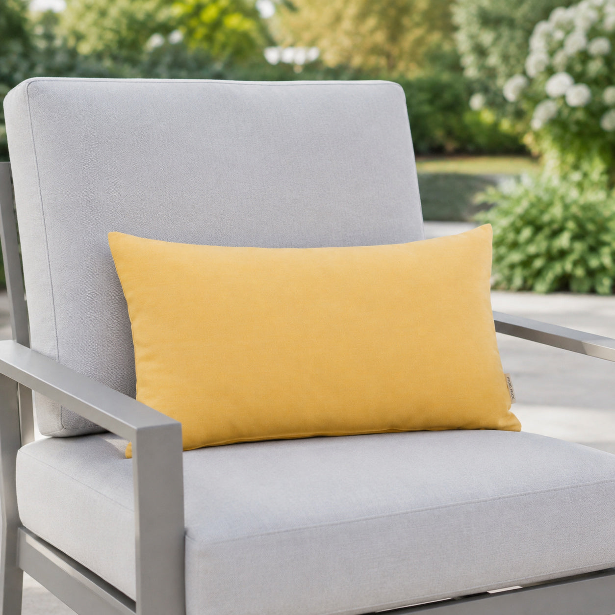 Sunbrella Outdoor Solid Pillow - Buttercup Yellow - 12x20 rectangular pillow - lifestyle