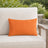 Sunbrella Outdoor Solid Pillow - Citrus Orange - 12x20 rectangular pillow - lifestyle