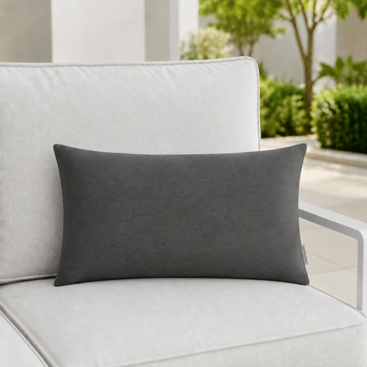 Sunbrella Outdoor Solid Pillow - Dark Gray - 12x20 rectangular pillow - lifestyle