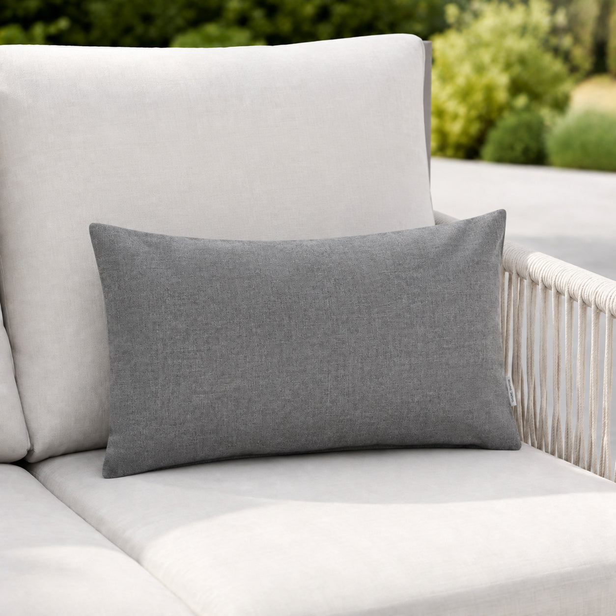Sunbrella Outdoor Solid Pillow - Heather Gray - 12x20 rectangular pillow - lifestyle