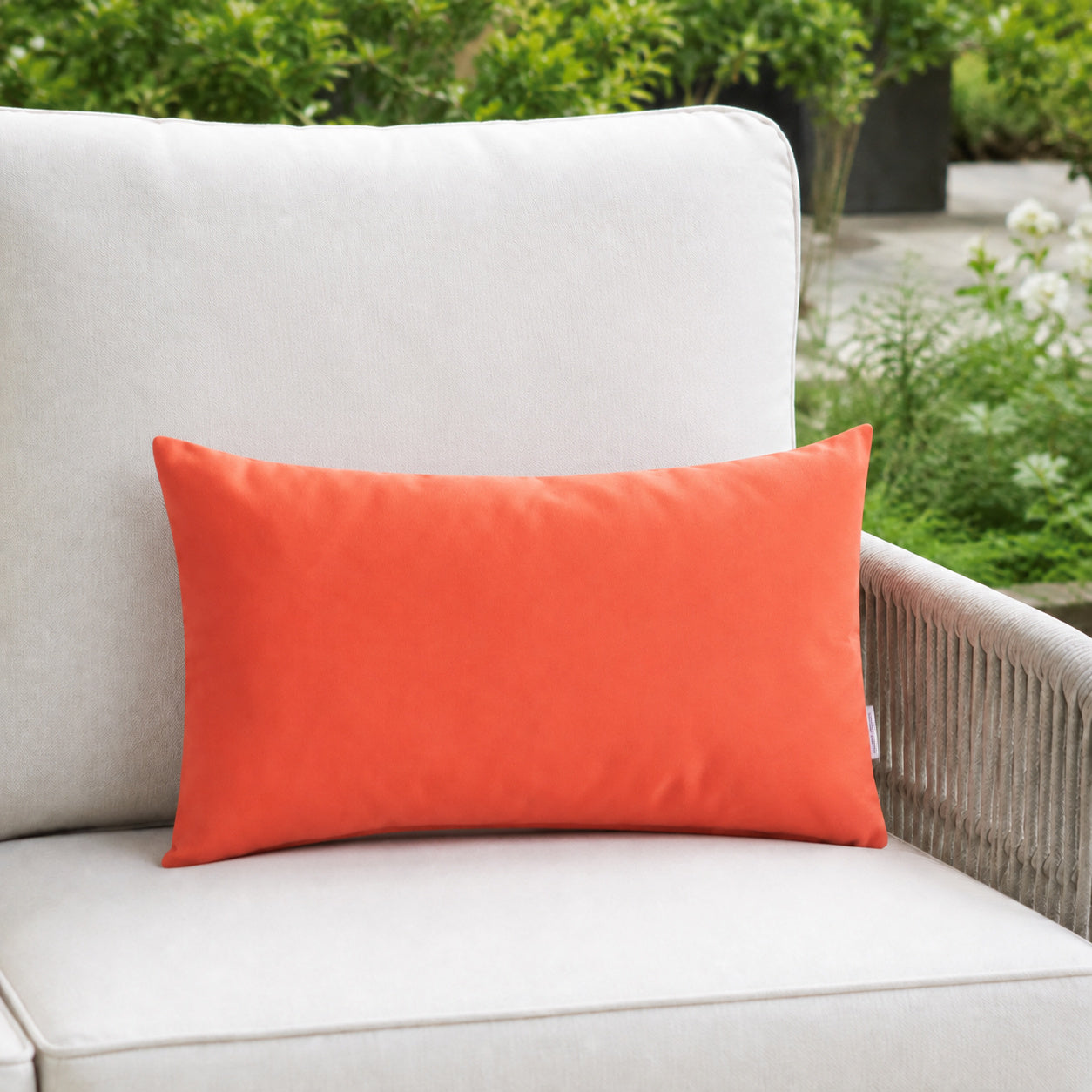 Sunbrella Outdoor Solid Pillow - Melon - 12x20 rectangular pillow - lifestyle