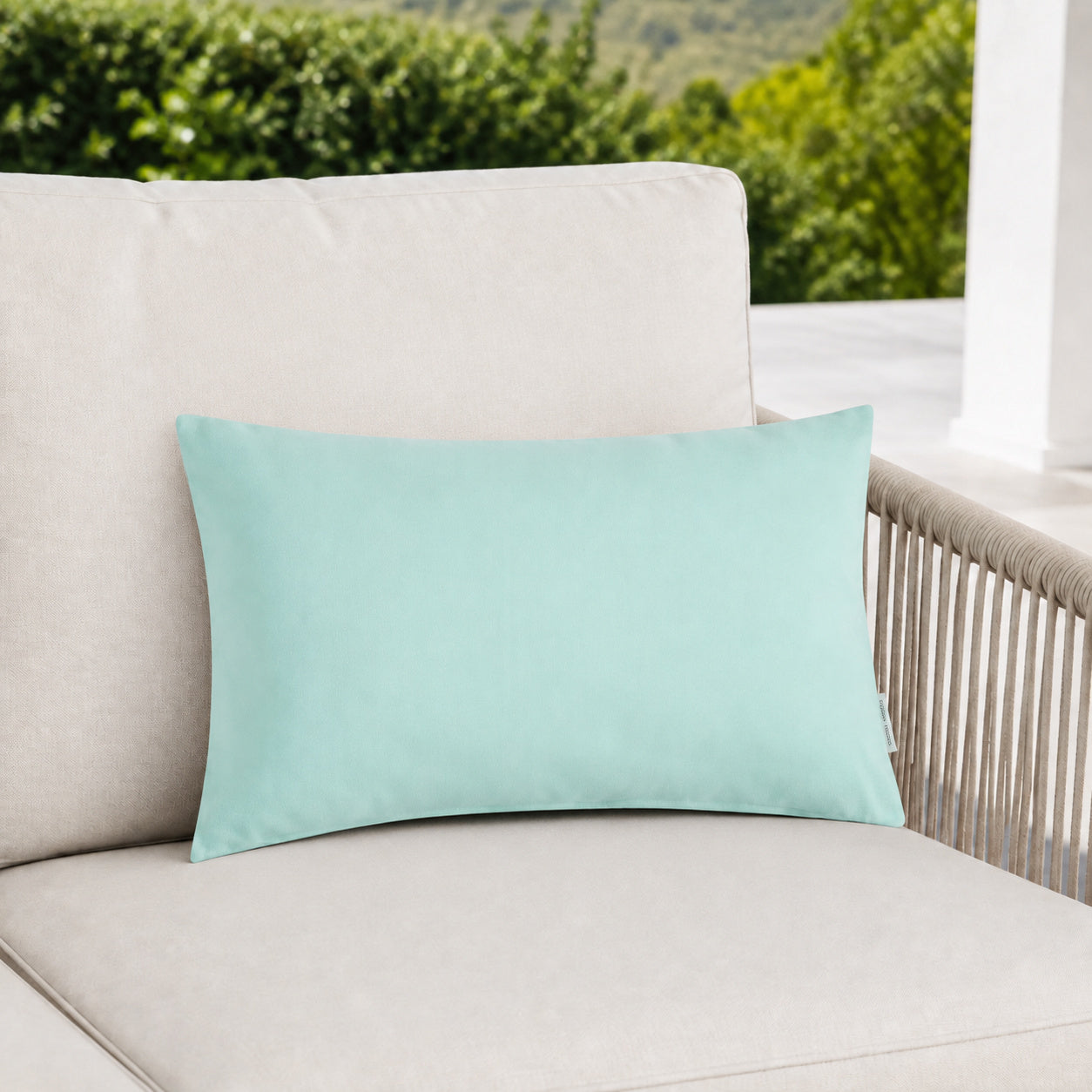 Sunbrella Outdoor Solid Pillow - Seafoam Blue - 12x20 rectangular pillow - lifestyle