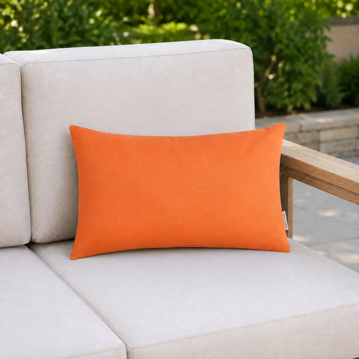 Sunbrella Outdoor Solid Pillow - Tangerine Orange - 12x20 rectangular pillow - lifestyle
