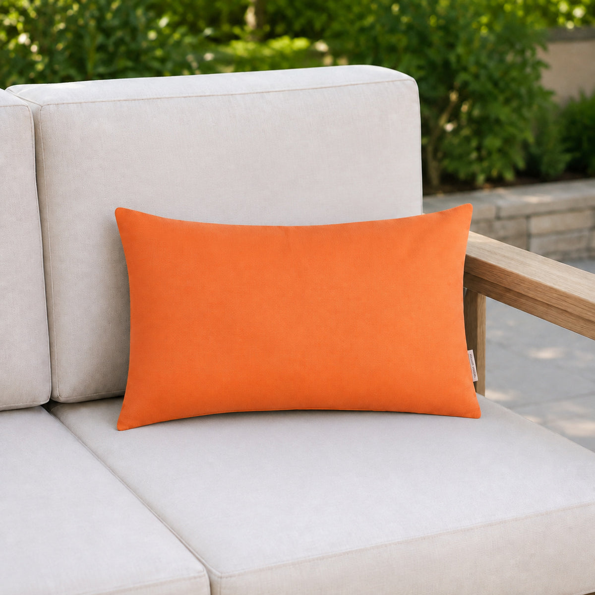 Sunbrella Outdoor Solid Pillow - Tangerine Orange - 12x20 rectangular pillow - lifestyle