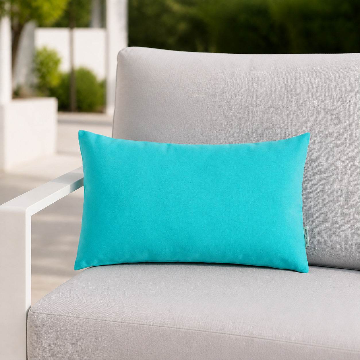 Sunbrella Outdoor Solid Pillow - Aruba Turquoise Blue - 12x20 rectangular pillow - lifestyle